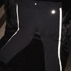 Lululemon black leggings with white stripe on side